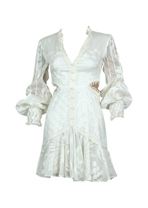 White dress with long sleeves and embroidery
