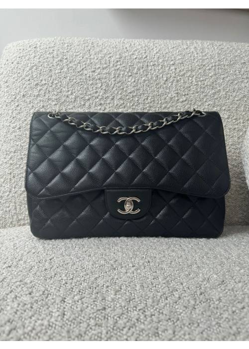 Chanel timeless jumbo double flap in black caviar leather
