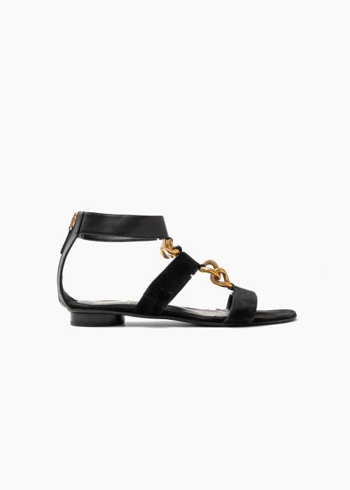 Flat sandals in black leather