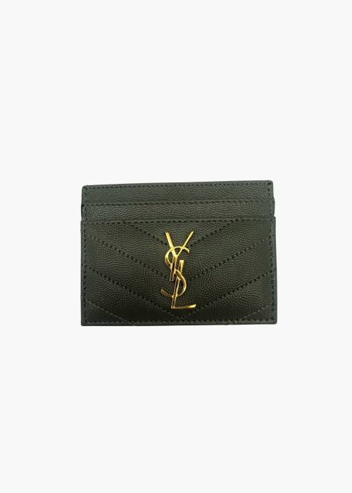 Dark green leather card holder with gold jewelry