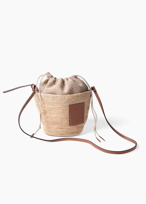Natural raffia and leather bucket bag