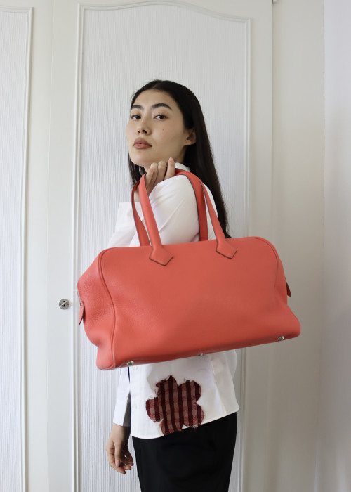 Hermes Victoria bag in coral leather