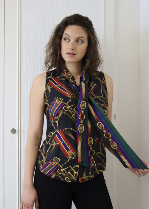 Black top with colourful equestrian motifs