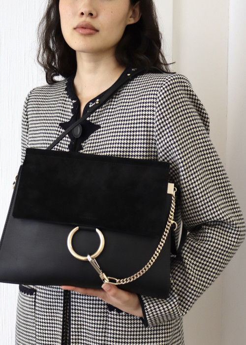 Suede and black leather bag