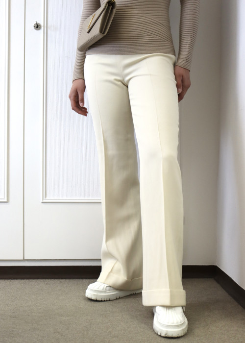 Woolen trousers in ecru colour