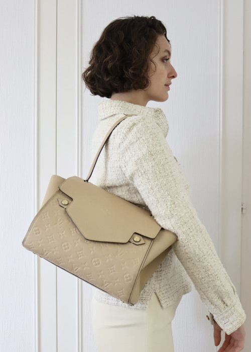 Beige leather bag with monogram