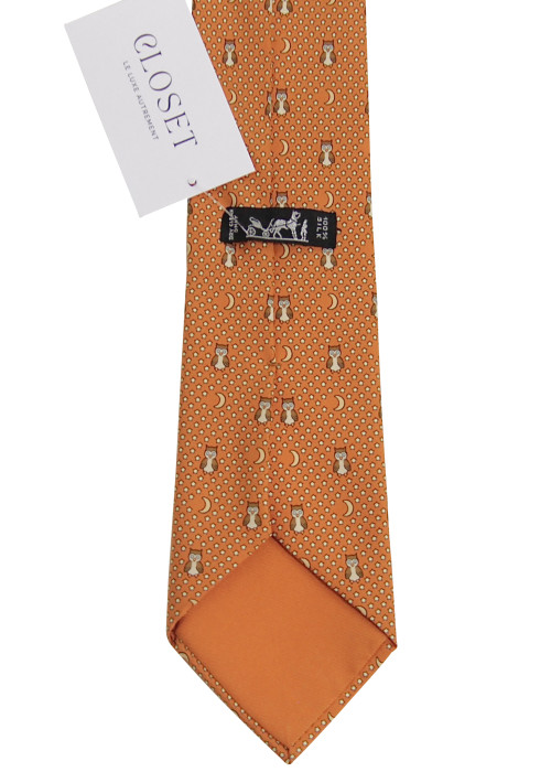 Orange silk tie with owl motif