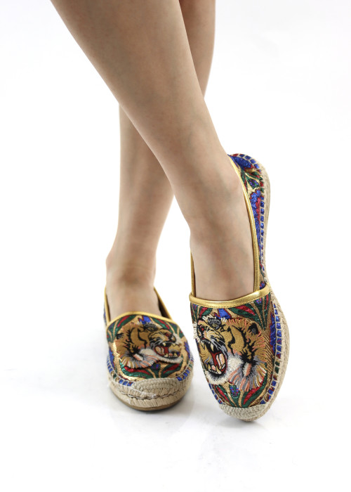 Coloured espadrilles with a tiger