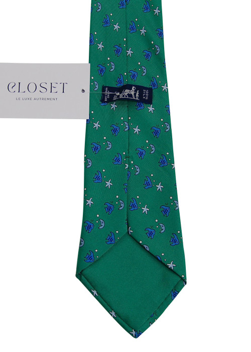 Green tie with fish motif