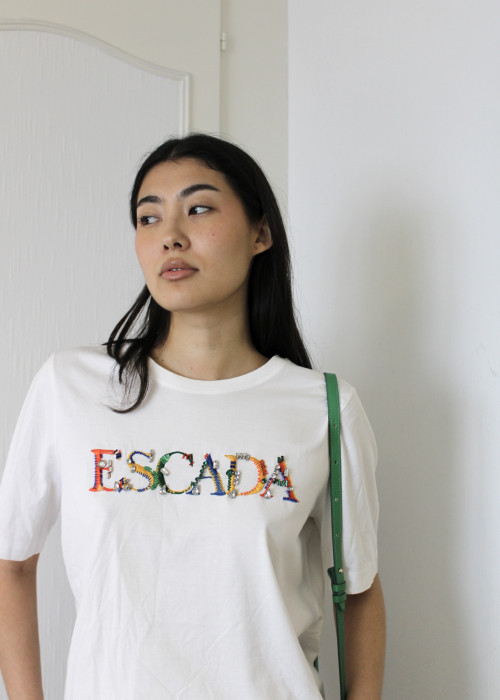 White T-shirt with colorful lettering