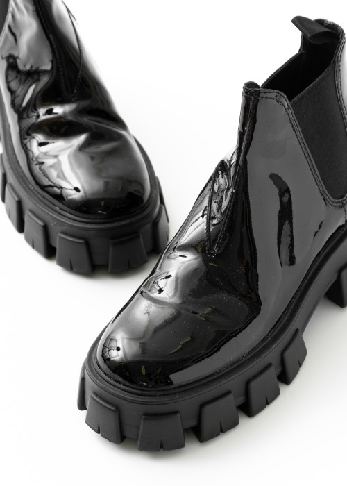 Monolith black patent leather boots