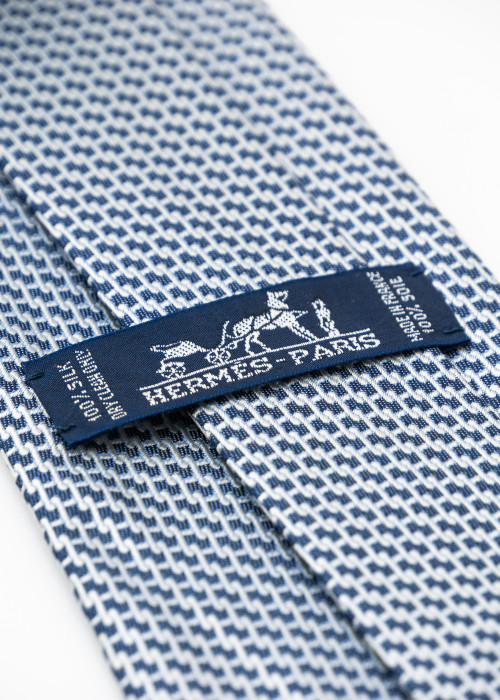 Navy blue and white silk tie