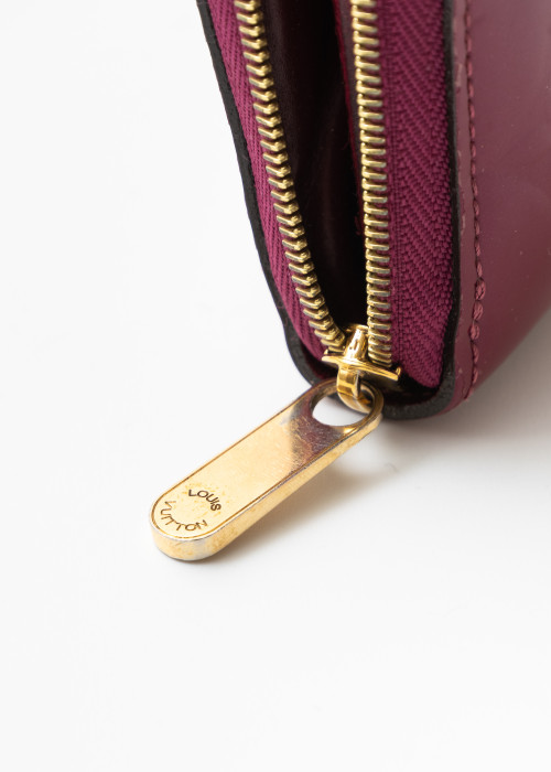 Portefeuille Zippy en cuir verni fuschia