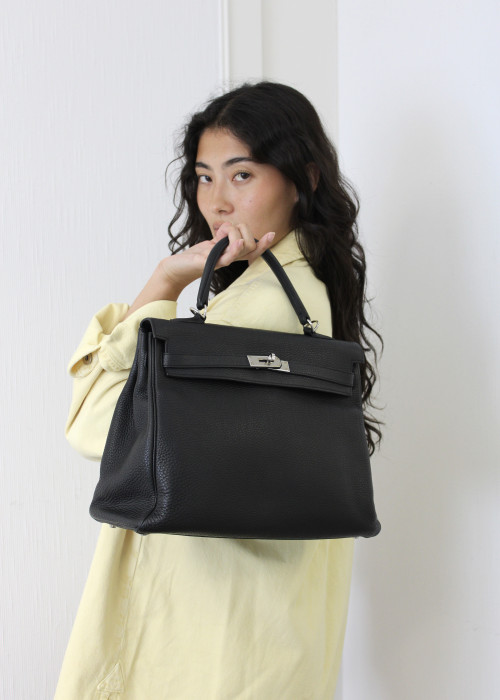 Kelly 35 bag in black leather Taurillon Clemence