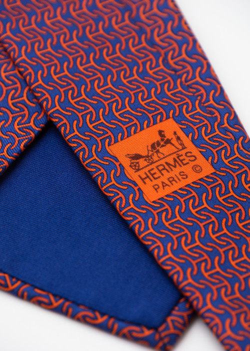 Navy blue and orange tie motif H