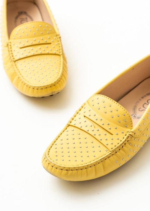 Yellow moccasins with studs