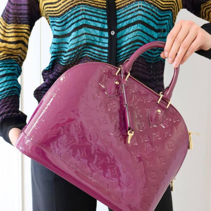 Louis Vuitton Alma purple handbag Louis Vuitton