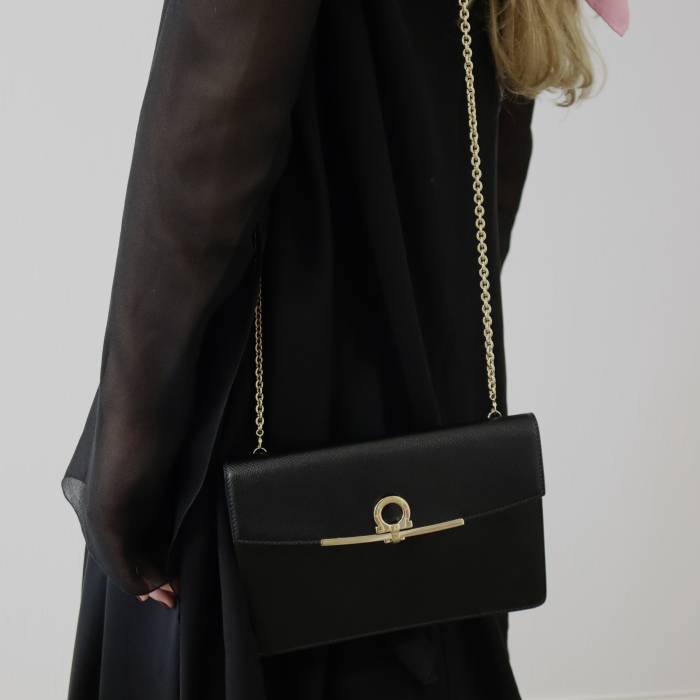 Black leather bag with gold jewellery Salvatore Ferragamo