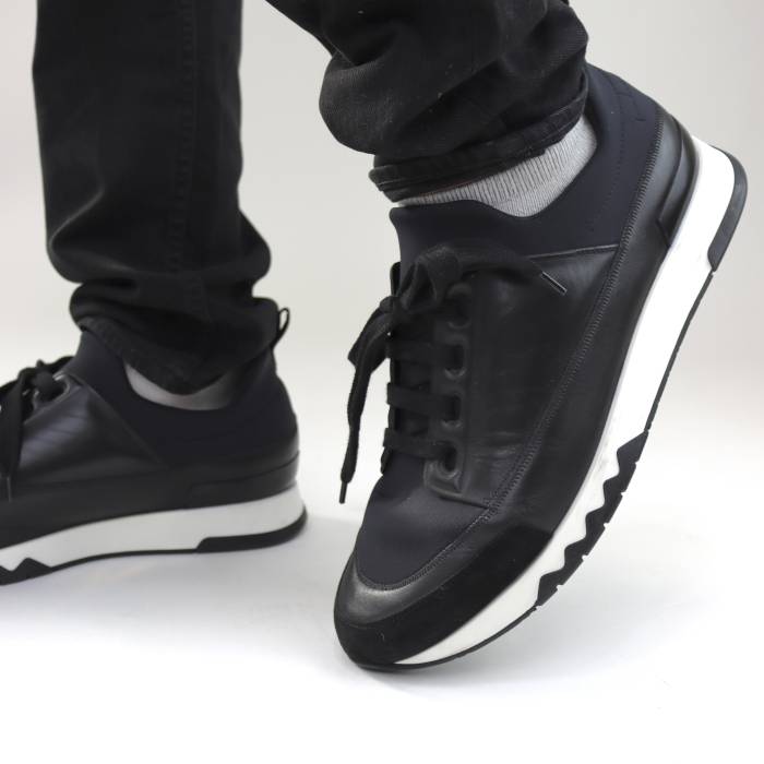 Hermès Sneakers aus schwarzem Leder Hermès