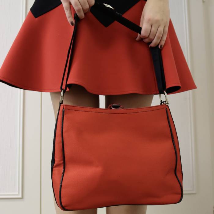 Red fabric and black leather bag Dior