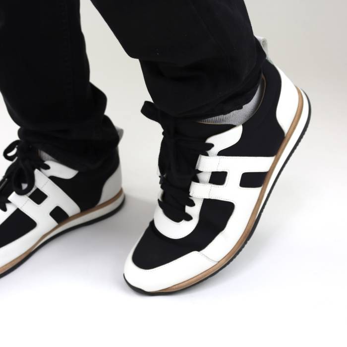 Sneakers aus schwarzem und weißem Leder und Stoff Hermès