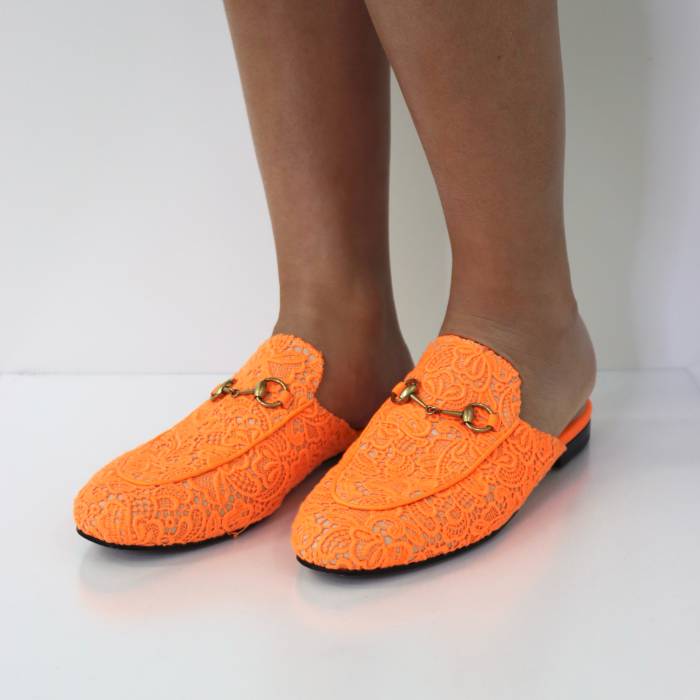 Leather mules with orange embroidery Gucci