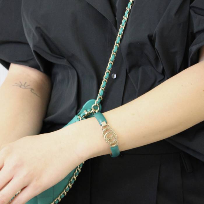 Interlocking bracelet in green leather and yellow gold Bulgari