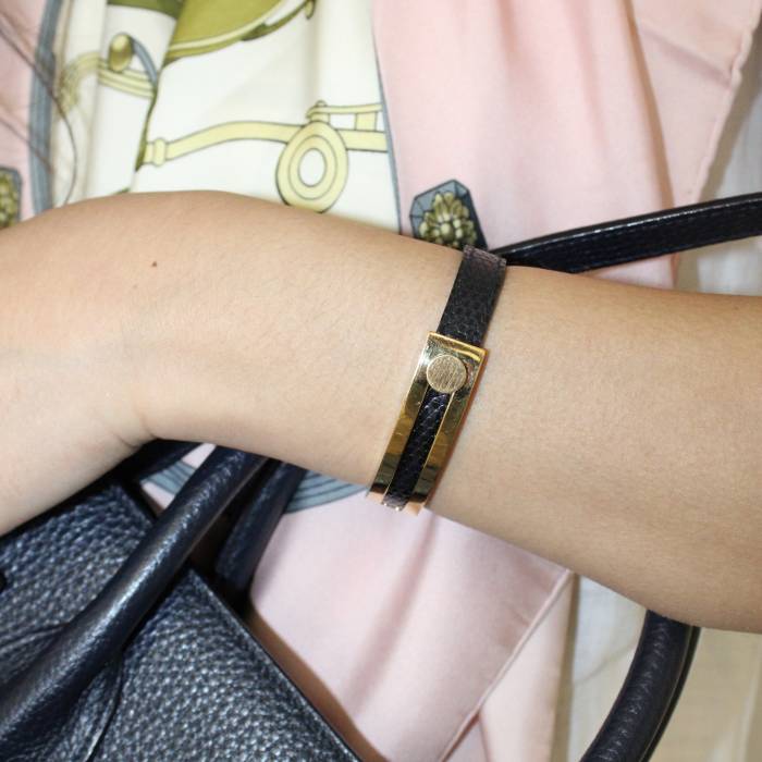 Bracelet en cuir noir et doré Hermès