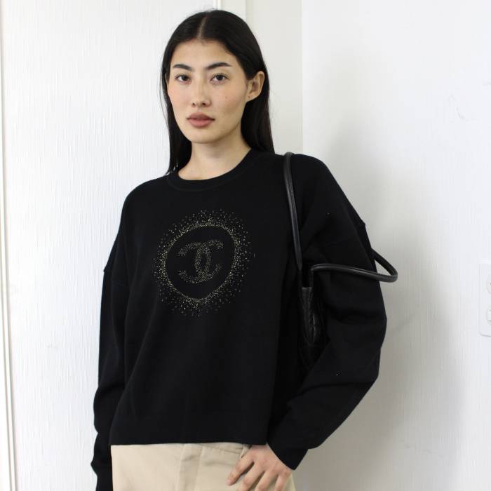 Black sweater with gold logo Chanel