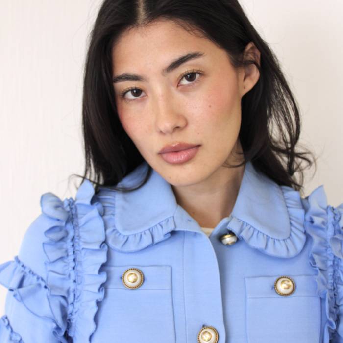 Short blue ruffled jacket Gucci