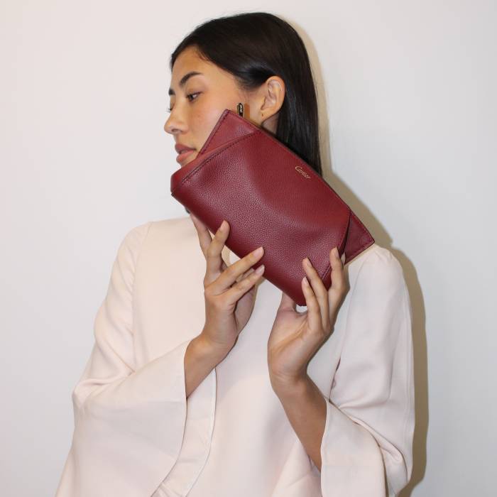 Pochette en cuir bordeaux Cartier