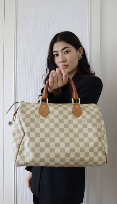Speedy bag in white checkerboard Louis Vuitton