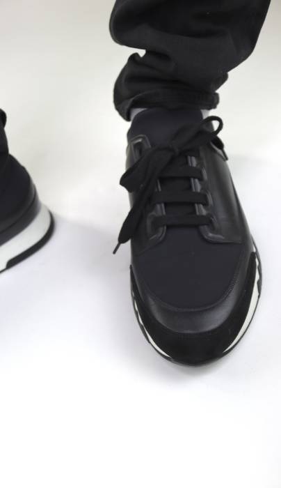 Hermès Sneakers aus schwarzem Leder Hermès
