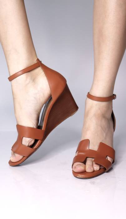 Pair of leather wedge sandals Hermès