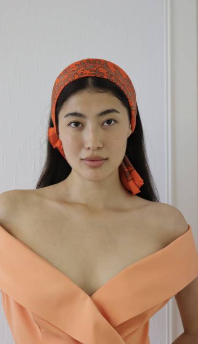 Orange silk scarf with animal motifs Hermès