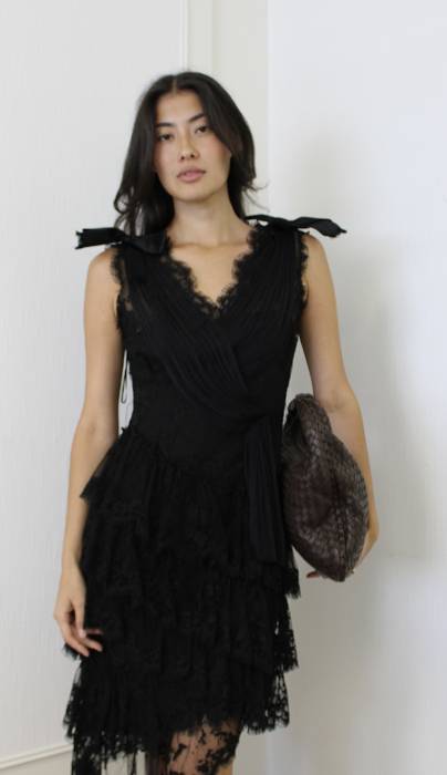 Robe noire avec dentelle et nœuds Chanel