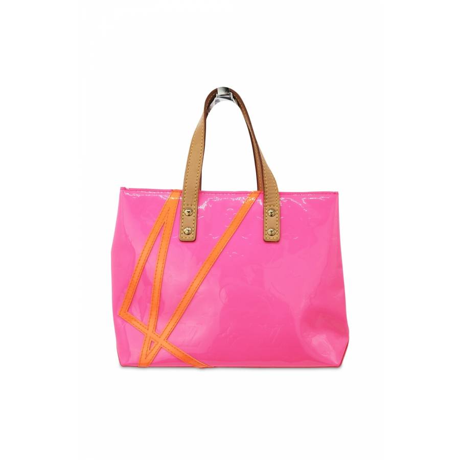 Small pink patent leather handbag
