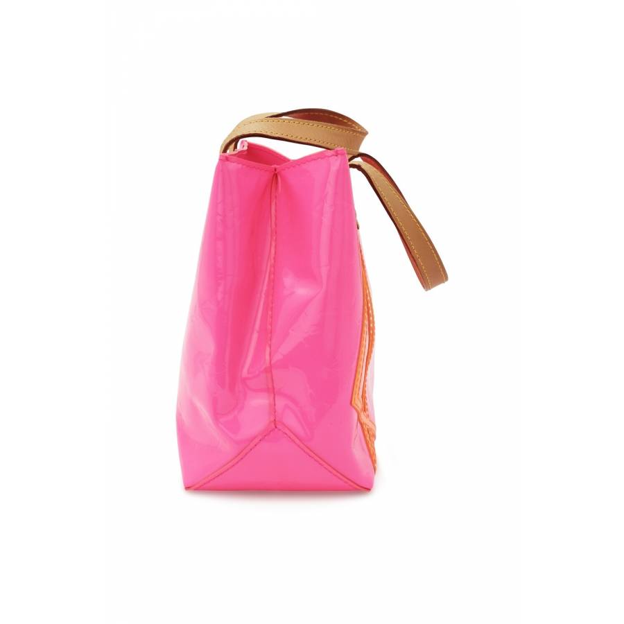Small pink patent leather handbag