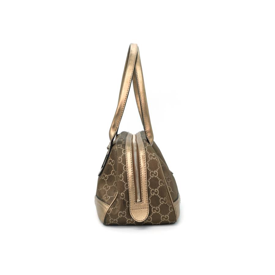 Gucci Handtasche aus goldfarbenem Stoff
