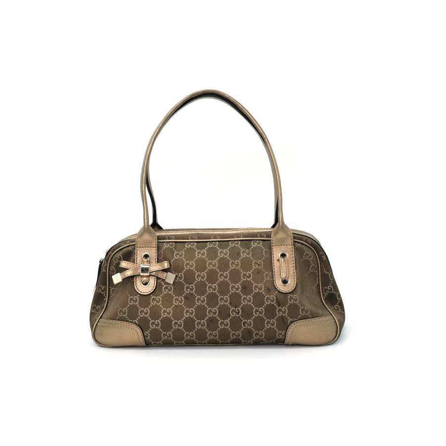 Gucci handbag in gold fabric
