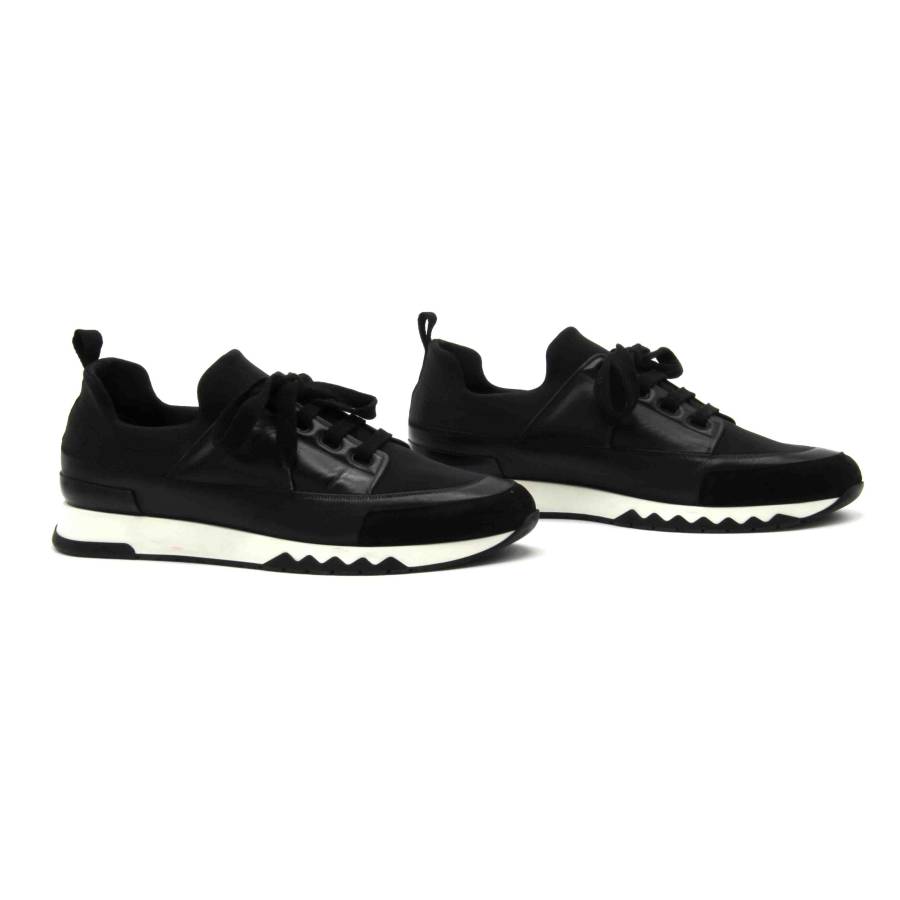 Hermès Sneakers aus schwarzem Leder