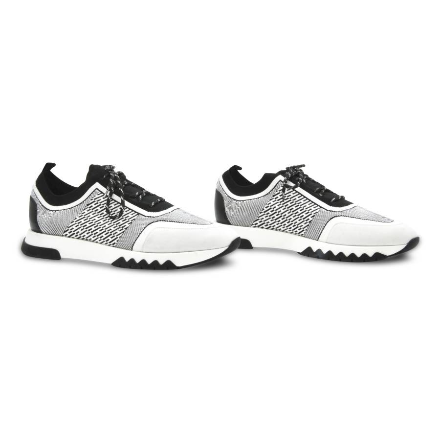 Schwarz-weiße Sneakers von Hermès