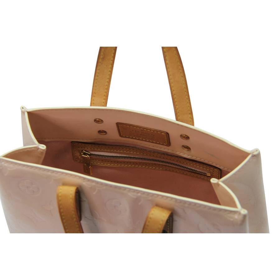 Pink patent leather handbag