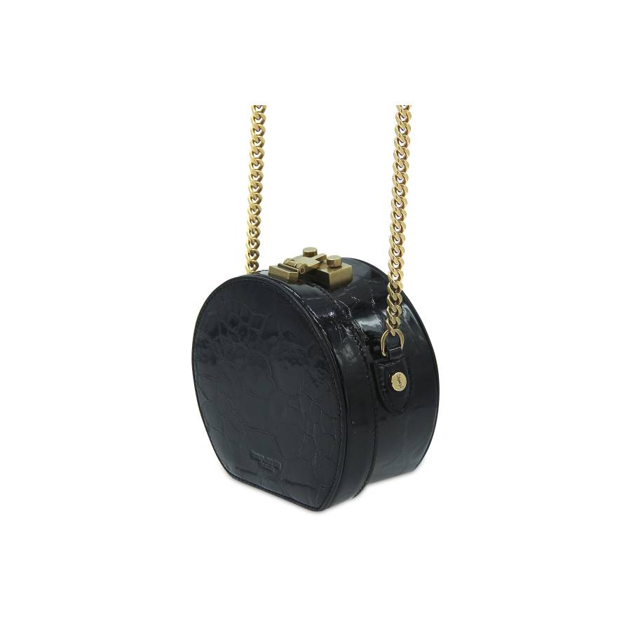 Round patent leather bag
