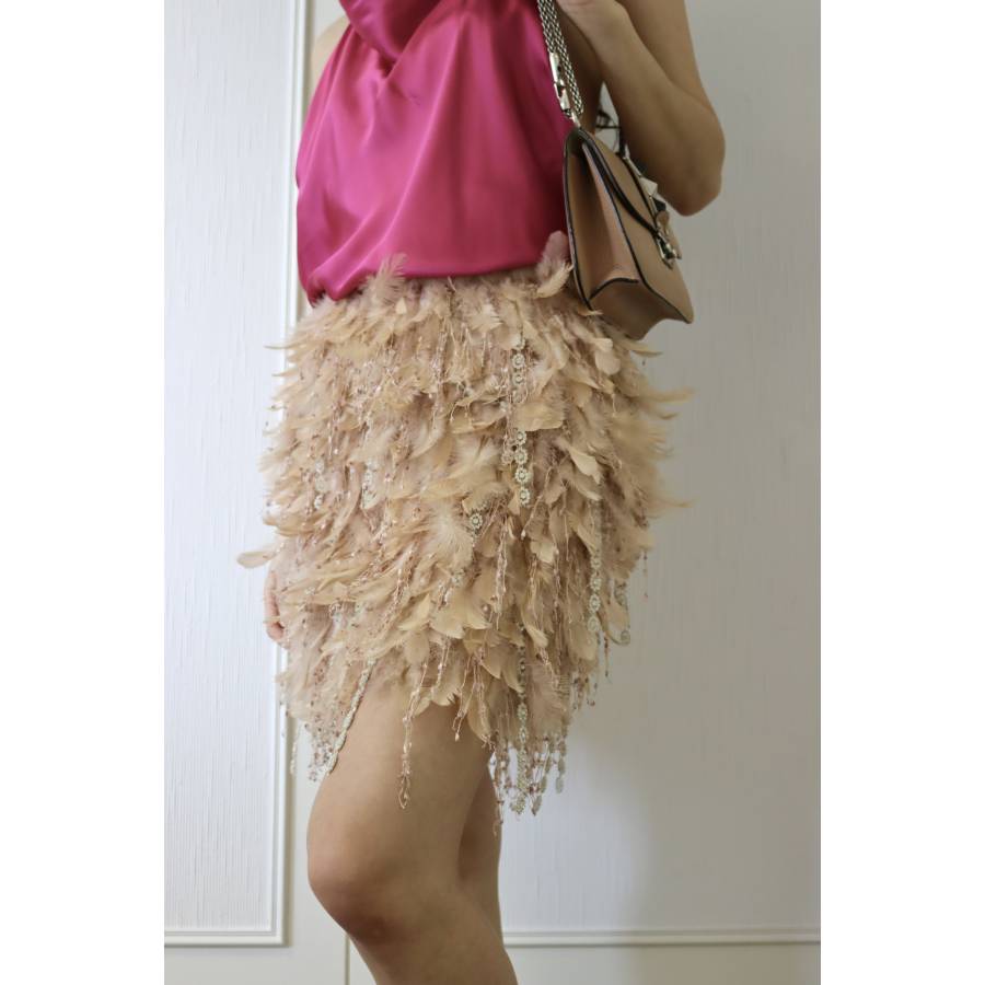Pink skirt with feathers