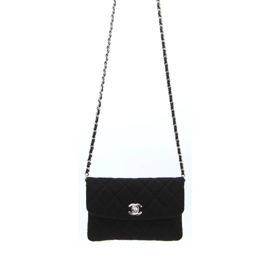 Black fabric bag with silver jewellery