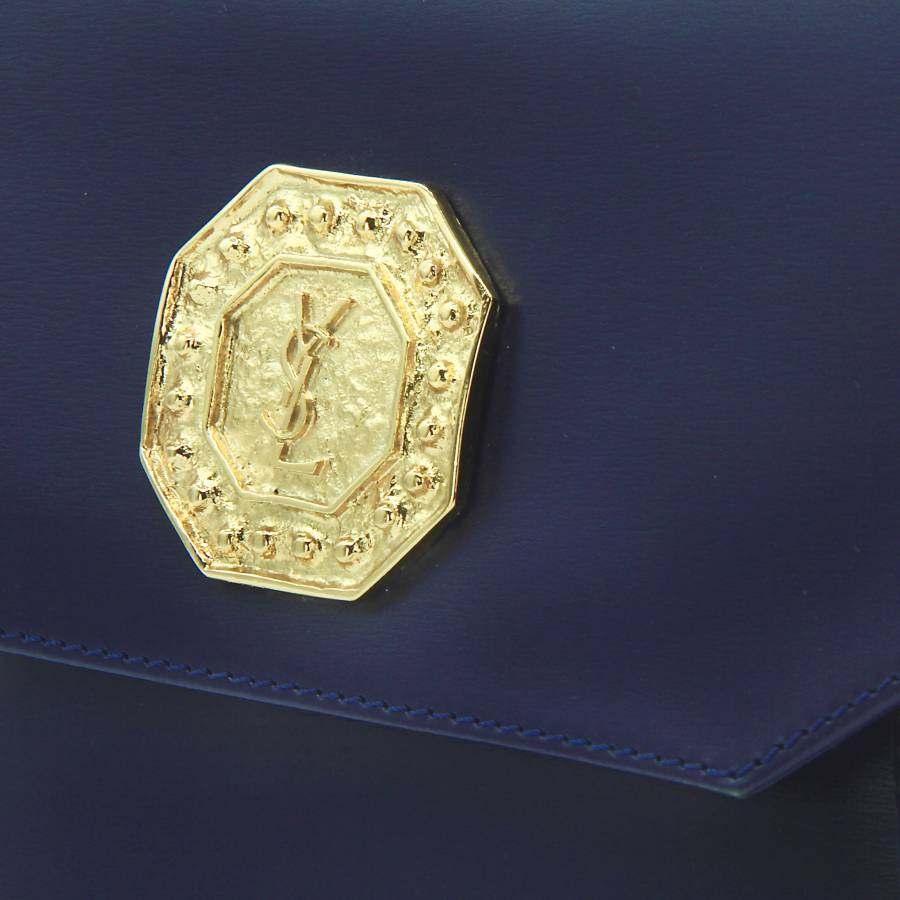 Saint Laurent bag with gold jewellery