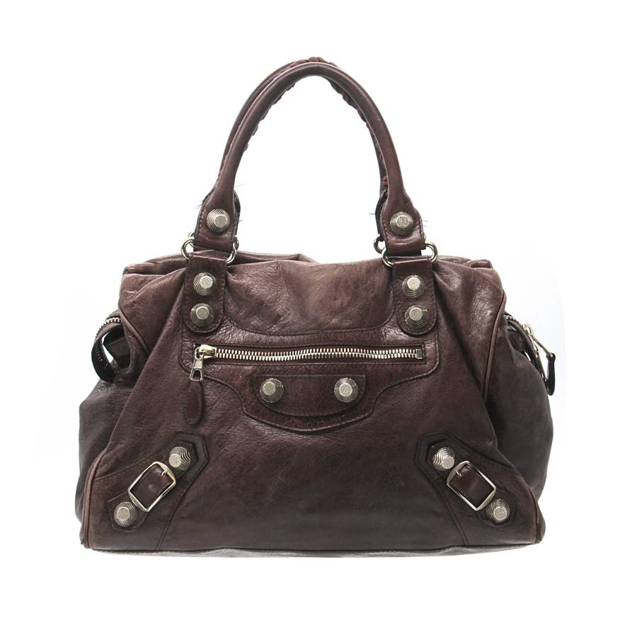Burgundy leather bag with silver jewellery