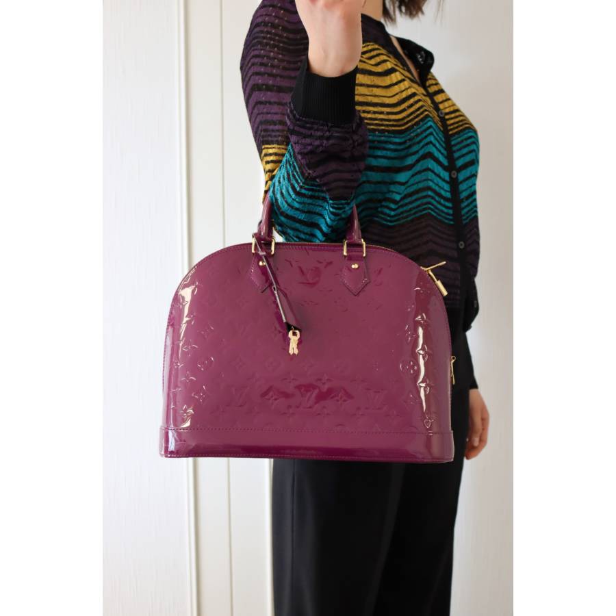 Louis Vuitton Alma purple handbag