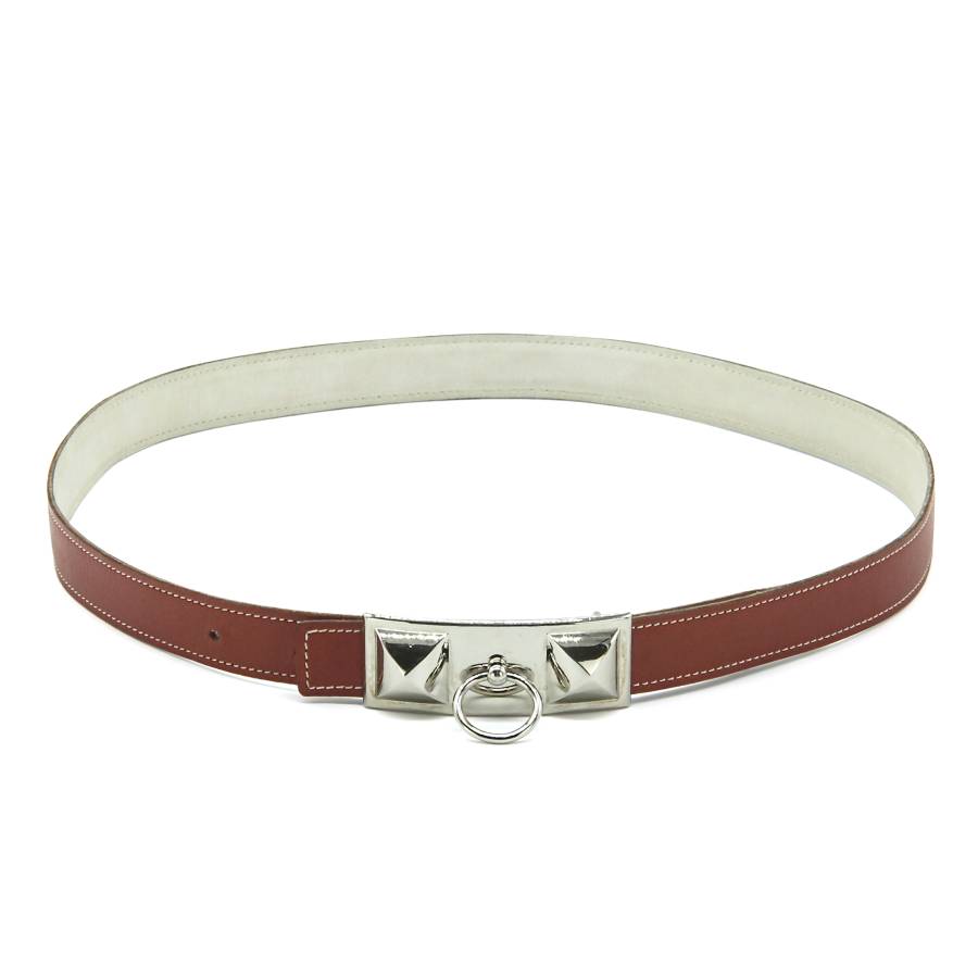Red leather belt with silver buckle